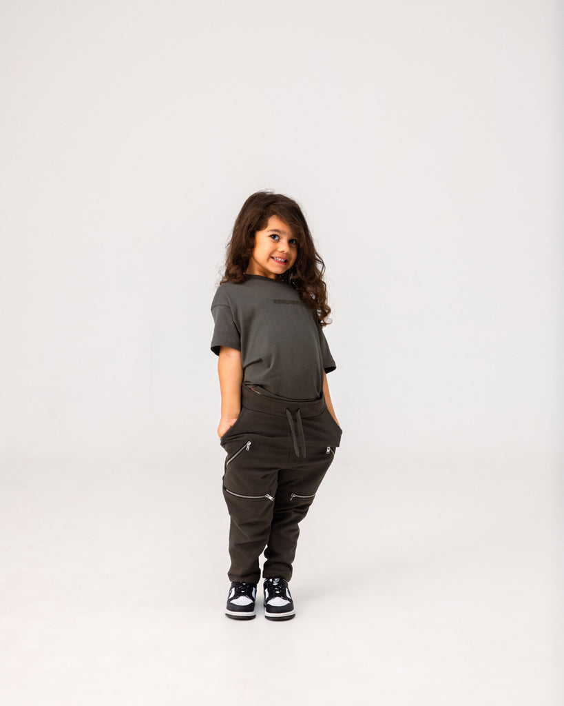 Kid in cargo trousers