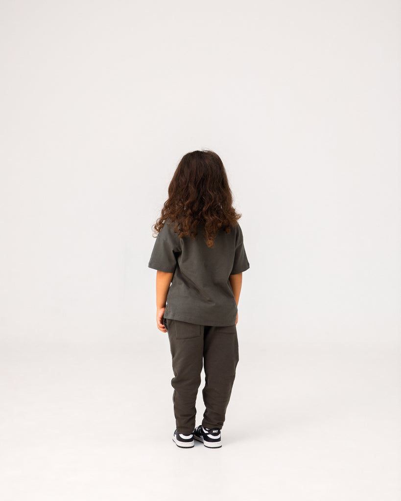 Kid in brown T-shirt